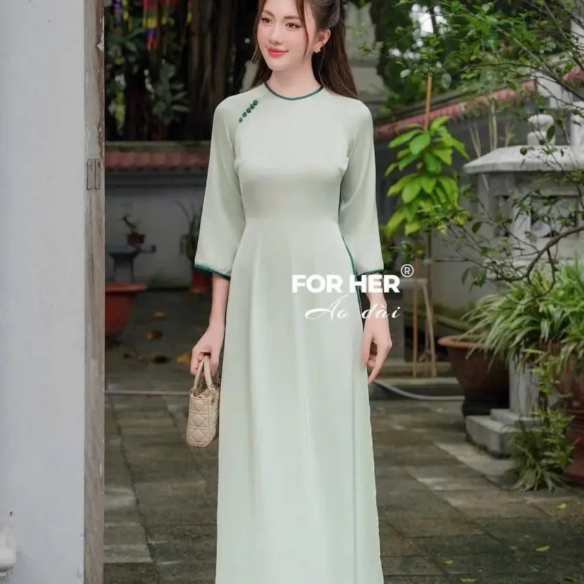 Áo dài cúc bọc cổ viền xinh xắn