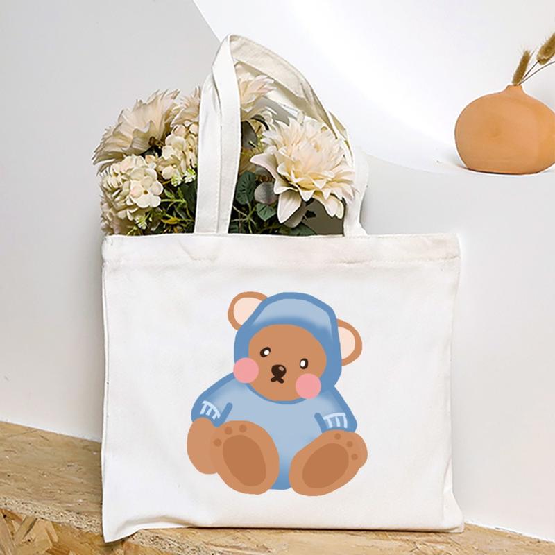 Product Introduction of Cute Cartoon Teddy Bear Printed Canvas Horizontal Handbag Fashionable Versatile One Shoulder Storage Bag 42