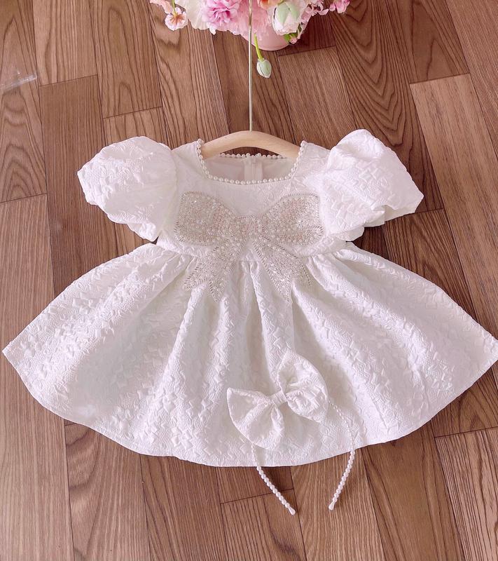 Váy xốp nơ đính ngọc cho bé (Màu trắng)