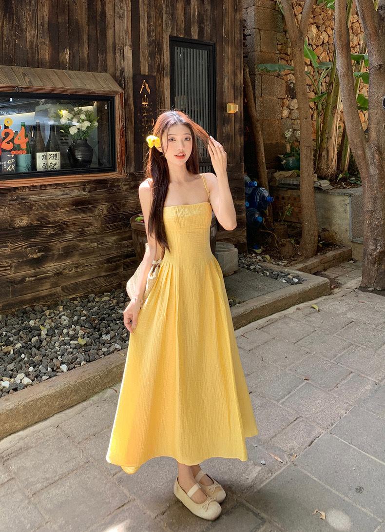 Product Introduction of French style short yellow camisole dress, women's waist cinching temperament long skirt, beach vacation dress 5