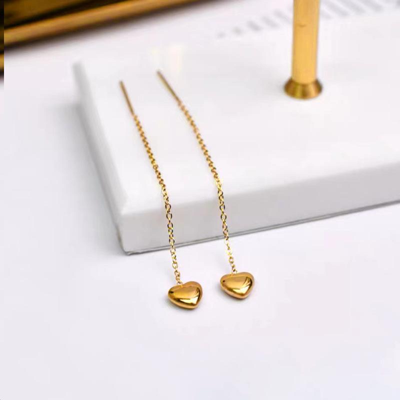 Product Introduction of Titanium steel color preserving solid heart-shaped lines with tassels, peach hearts wrapped in gold, heart-shaped long ear lines, ins, slimming ear chains that highlight the face 5
