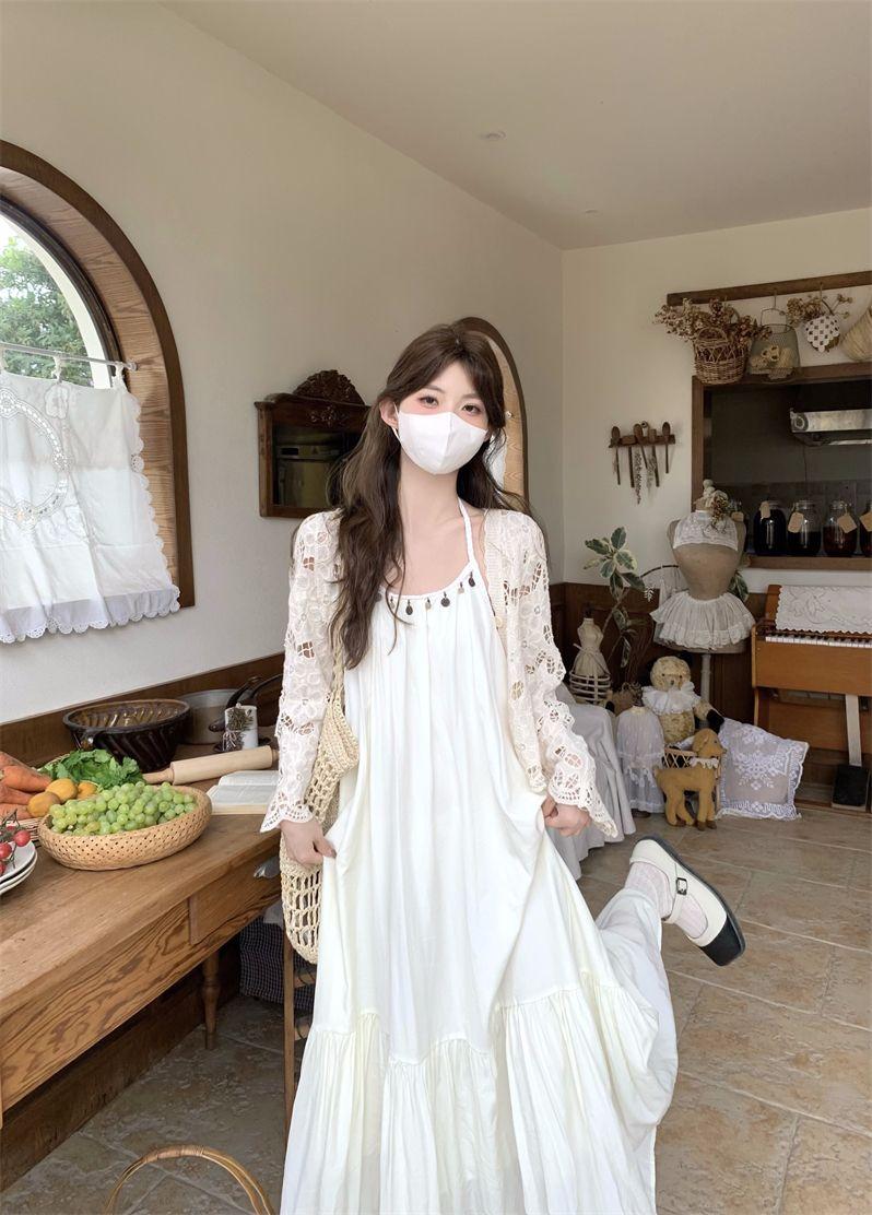 Product Introduction of Simia Hollow Suspender Dress Tassel Long Dress Two-piece Set Sunscreen Cardigan Mori 4