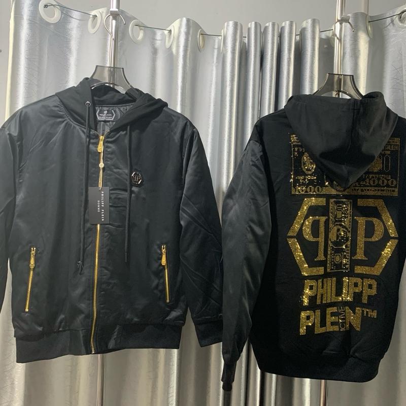  Áo khoác phao hoodi có mũ đính đá vàng  đầu lâu philip chất vải gió hàn bên trong lót bông len from chuân đep khoá titan chuân 