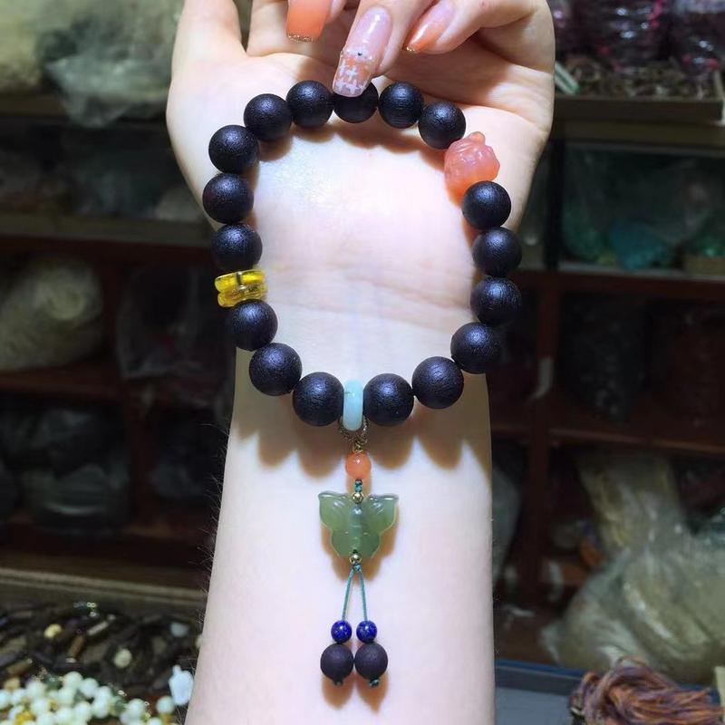 Product Introduction of Live Broadcast Supply Wholesale Acronychia Pedunculata Bracelet Female Men's Crafts Prayer Beads Jewelry Beeswax Hetian Jade Spacer Beads Bracelet 7