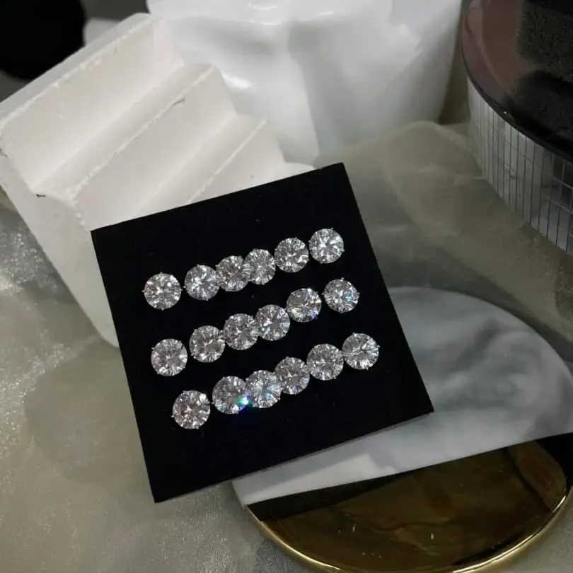 BT23 Bông tai 1 hột 9li 4 chấu (chốt đẩy)