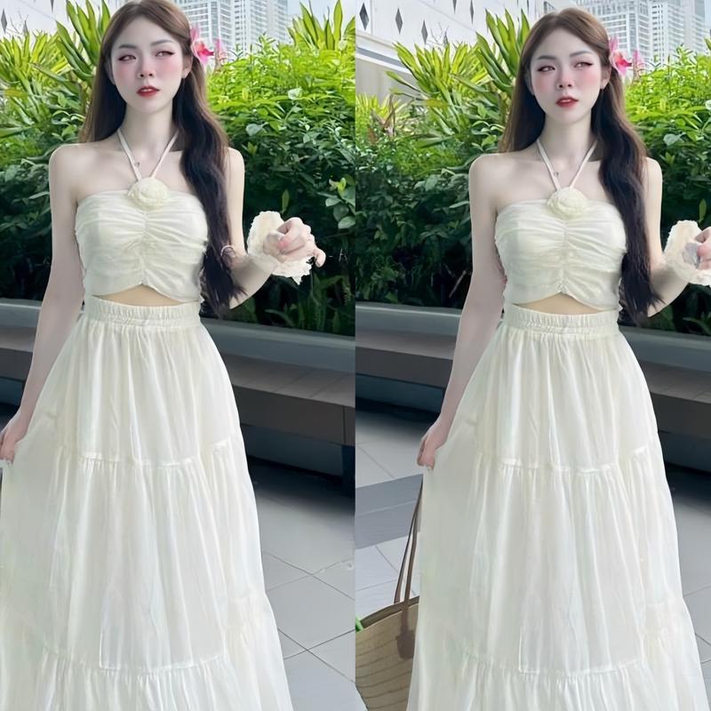 Set váý nữ voan hai lớp thiết kế 2 dây cổ yếm kèm hoa mocking sau lưng mix chân váy xòe dáng dài sang chảnh dành cho các nàng diện di chơi.  Women Nhung Dress