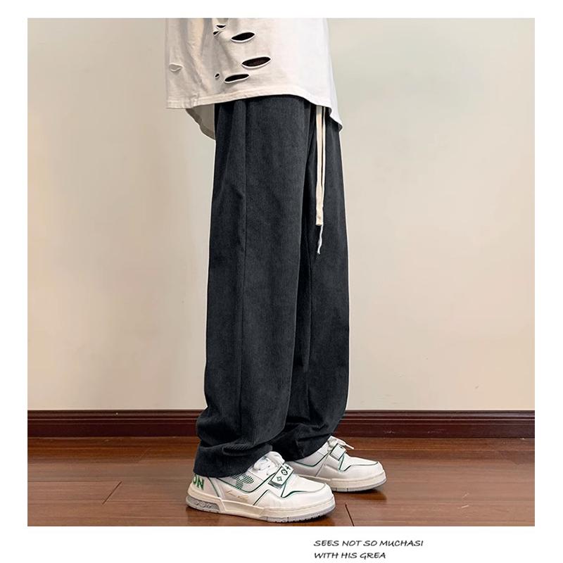Product Introduction of Celana Corduroy Panjang unisex celana korduroy pria korean style baggy pants coklat retro celana kulot pria oversize cordutoy Pants celana panjang pria loose pants celana pria keren celana hitam celana kain celana corduroy pria  Remaja Casual Straight 35