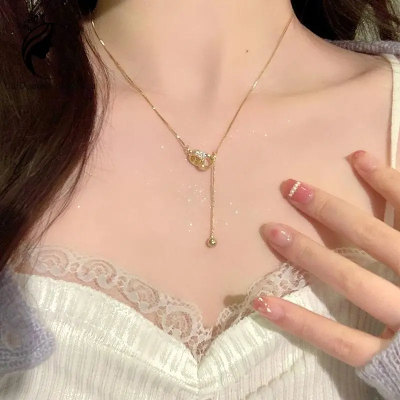Kalung dengan jepitan lingkaran ganda, baja titanium, tahan luntur 0