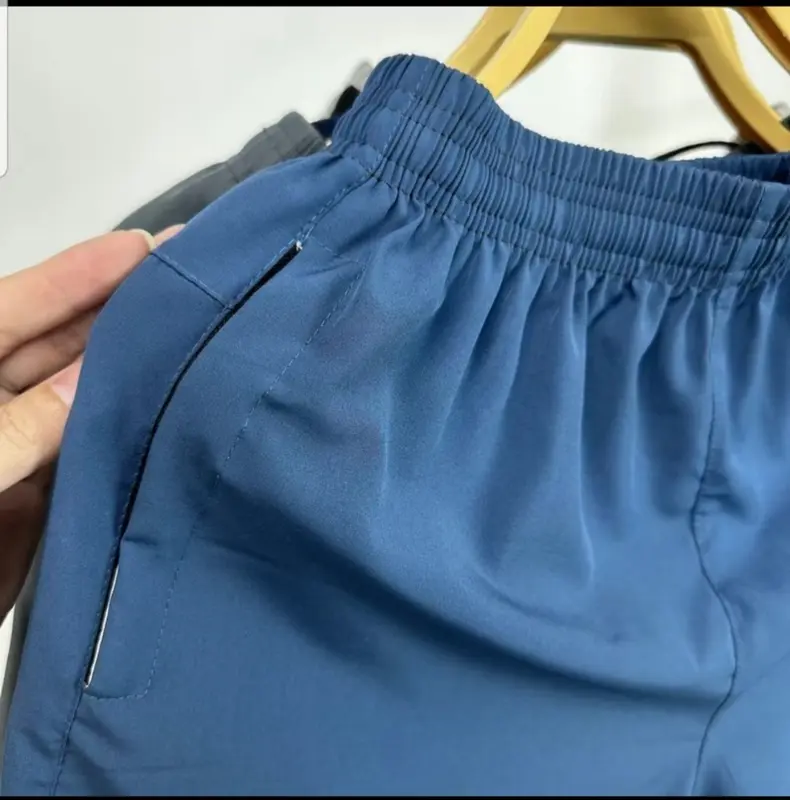 Combo 4 quần short nam , quần lửng , quần đùi chất liệu gió lụa co dãn thoáng mát có dây rút Có Túi Menswear quầnkhôngnước 2
