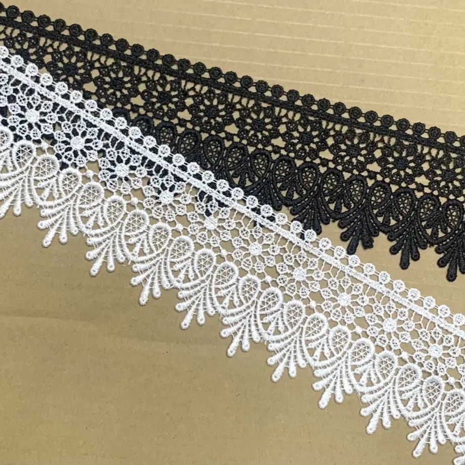1mét Ren chỉ 7cm, hoa văn đẹp mắt, màu đen trắng.