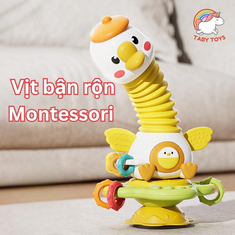 Đồ chơi Vịt Bận Rộn Montessori Có Xúc Xắc, Gặm Nướu, Phát Nhạc Và Có Thể Gắn Chặt Vào Bề Mặt Trơn Giúp Bé Rèn Luyện Cầm Nắm, Tập Trung Khi Ăn TABY Toys
