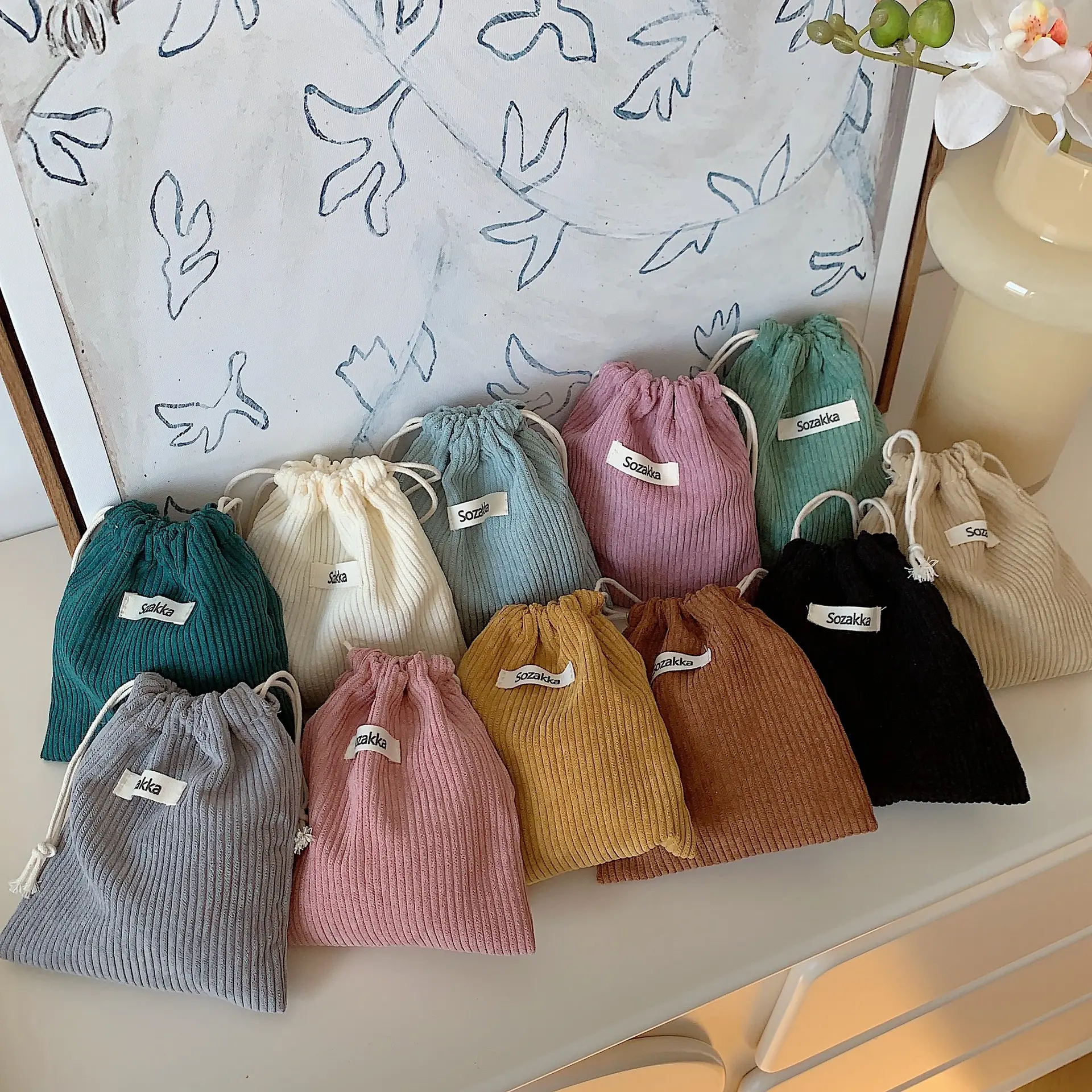 Solid color corduroy woven mark storage bag drawstring bundle cosmetic bag women's portable carry-on large capacity