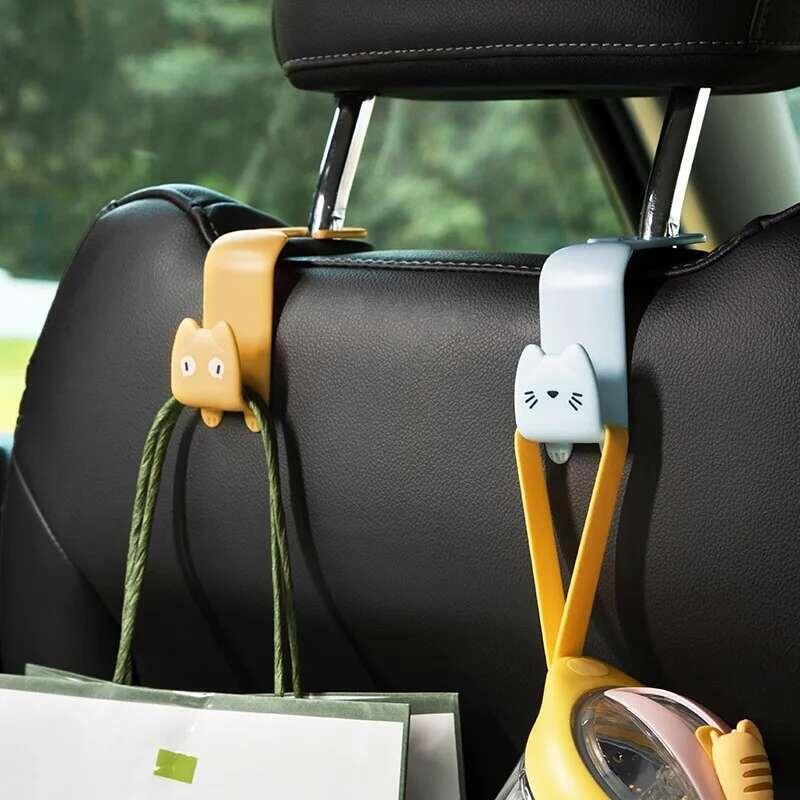 Product Introduction of 2pcs Creative Cute cat Car Seat Hooks Behind-seat Accessories Organizer Hook Bags Clothes Sundries Hanger Clip 1