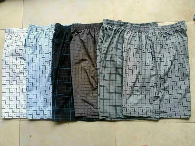Product Introduction of Quần đùi short nam kẻ sọc , mặc ở nhà hay mặc tập thể dục thể thao sai50-75kg chiều dài 50 cm Có Túi 12