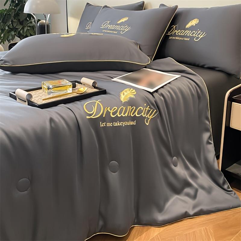 Product Introduction of 1 Piece Dreamy Summer Light Quilt - Soft, Light Beige Friendly 100% Microfiber, Designed with Gold Leaves and "DREAMCITY" Words, Gray with Gold Accents, Machine Washable, Pillowcase and Bed Sheet Not Included, Summer Bedding | Fantasy-themed Decoration | 1