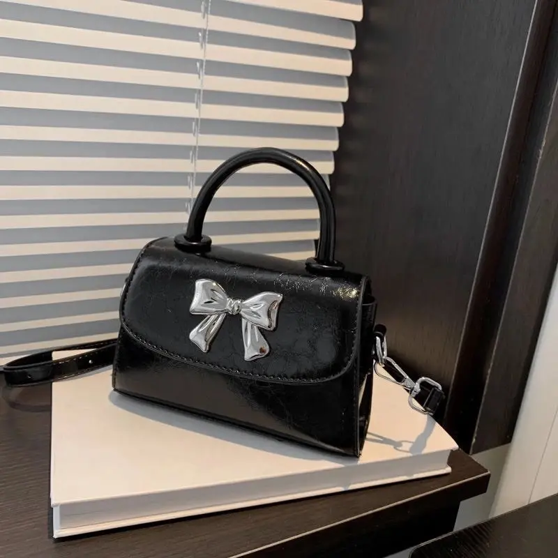 Túi xách nữ cầm tay đeo chéo da trơn Đính Nơ Bạc xinh xắn Bag 0