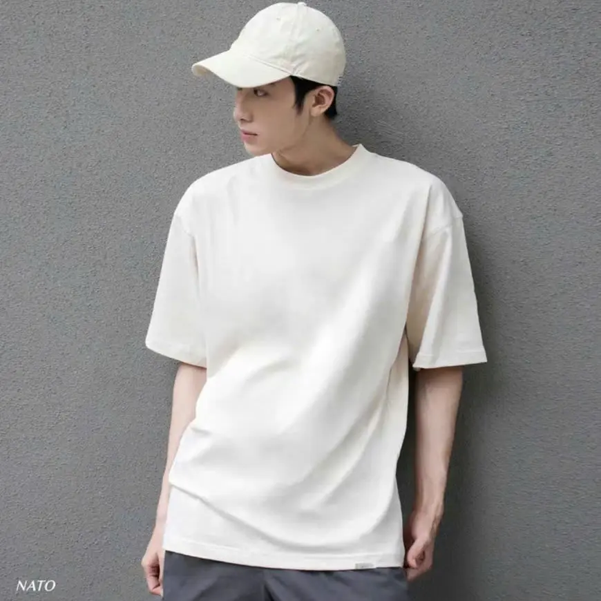 Áo thun trơn  nam nữ, cotton , siêu phẩm  cho hè này  chất vải Coton co dãn 4 chiều siêu ĐẸP  cho ae boy phố