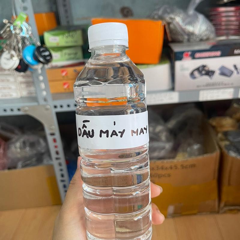 Dầu máy may, dầu máy khâu công nghiệp, dầu tra máy bôi trơn...chai 500ml và 1lít Phụ Tùng