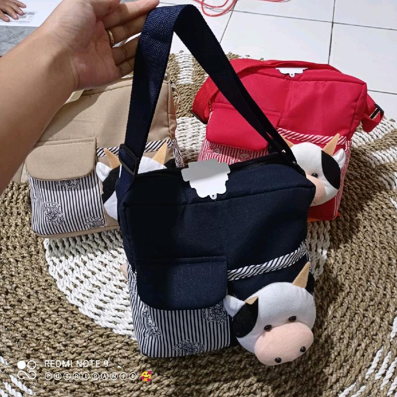 Tas bayi kecil boneka sapi 3