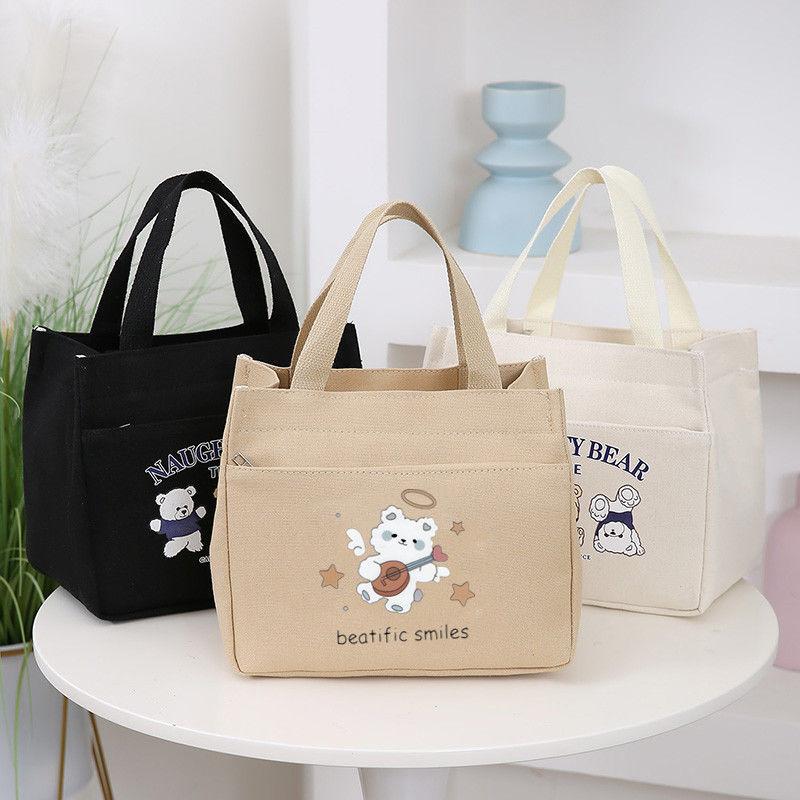 Product Introduction of New Canvas Handbag Large Capacity Simple Office Worker Student All-Match Lunch Box Mummy Work Bento Canvas Bag 2