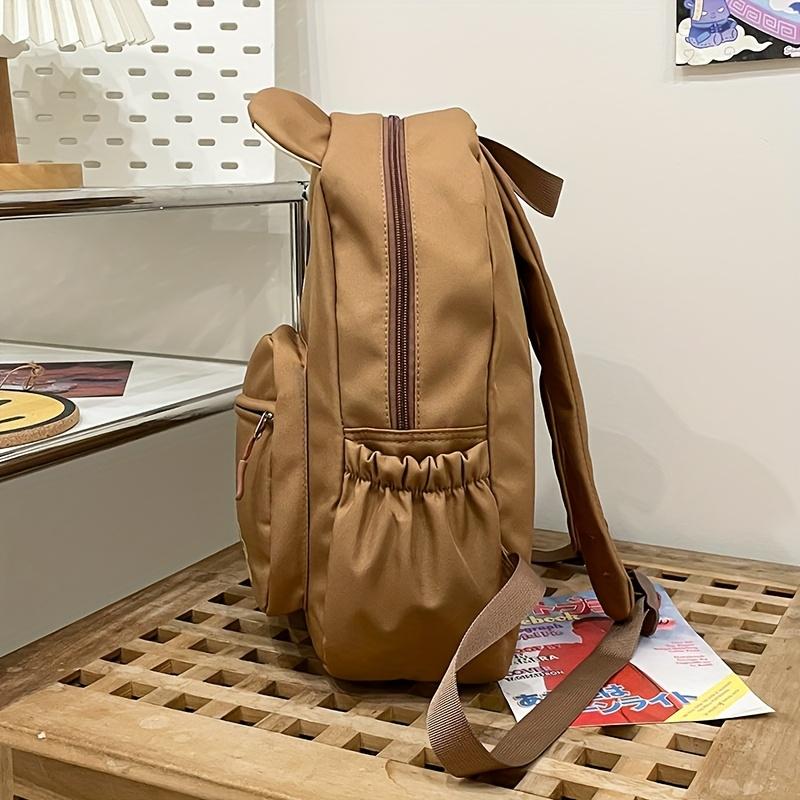 Product Introduction of Chic Bear-Themed Nylon Backpack for Women - Casual School & Travel Daypack, Solid Color with Practical Pockets, Available in White/Brown/Yellow 17