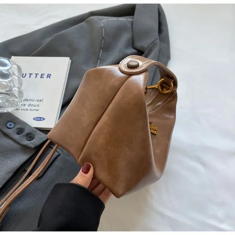 Túi da nâu ánh hồng da mềm đanh kèm khóa gấu kim loại dáng giọt nước Bag Nữ Kem 4