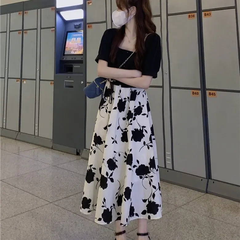 Chân váy voan lụa họa tiết hoa to trắng đen QC