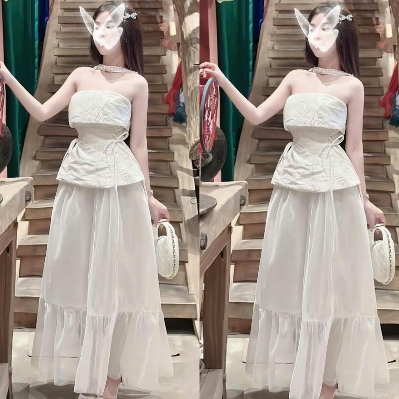 Set váy nữ áo gấm thiết kế trễ vai cúp ngực có dây cột eo kèm chân váy tơ 2 lớp dài dáng xòe xinh xắn dành cho các nàng đi tiệc đi chơi. Women top