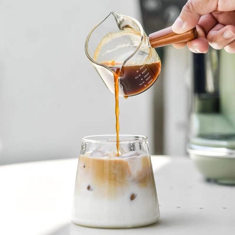 Product Introduction of 1/2pcs 100ML Double Spout Coffee Milk Glass Pot with Wood Handle Cute Measuring Frothing Pitcher Latte Cup for Barista Coffee Making 5
