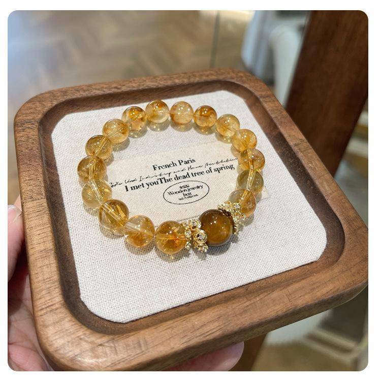 Product Introduction of Natural Yellow Pagoda Crystal Tiger Eye Stone Unique Niche Wealth-Attracting Bracelet for Women Large Round Beads Accessories Wholesale from Manufacturer 0