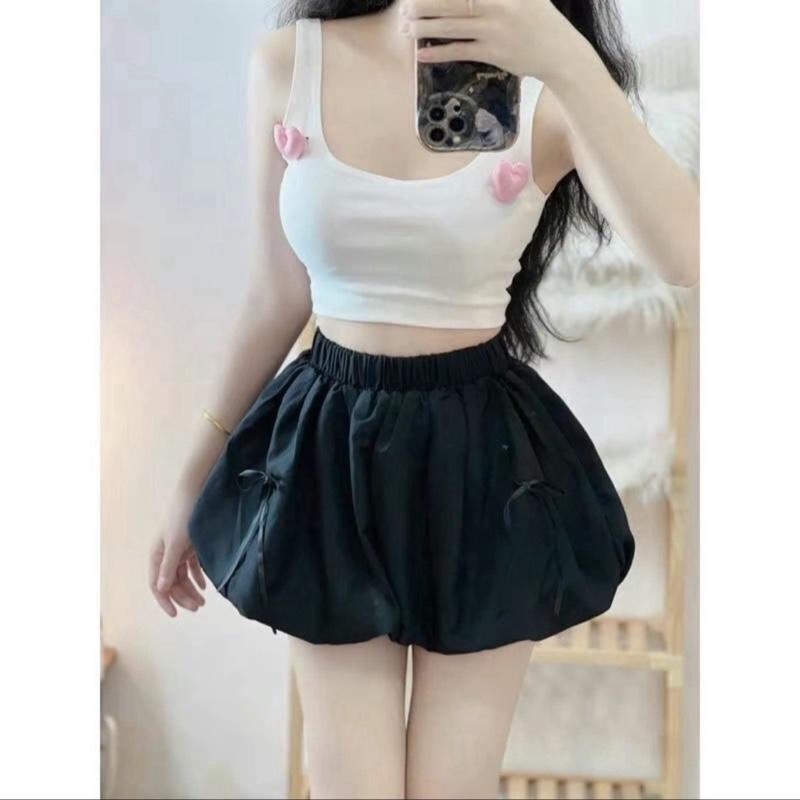 Quần đùi bí ngô phồng gắn nơ siêu xinh 2 lớp có 2 màu đen trắng freesize 40-58ki Nữ Women