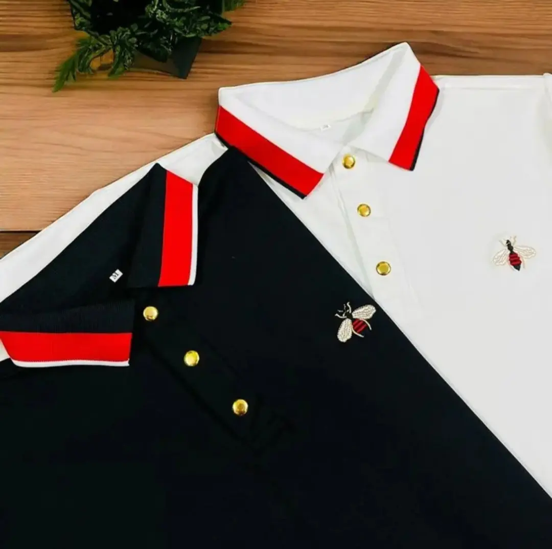 Áo polo nam cao cấp thêu họa tiết  thời trang được đính nút vàng sang trọng chất vải dày dặn đẹp 2 màu trắng đen,mẫu mới GIN MAN STORE Menswear Ong Ngắn Tay Shirt Cộc Tay Có Cổ