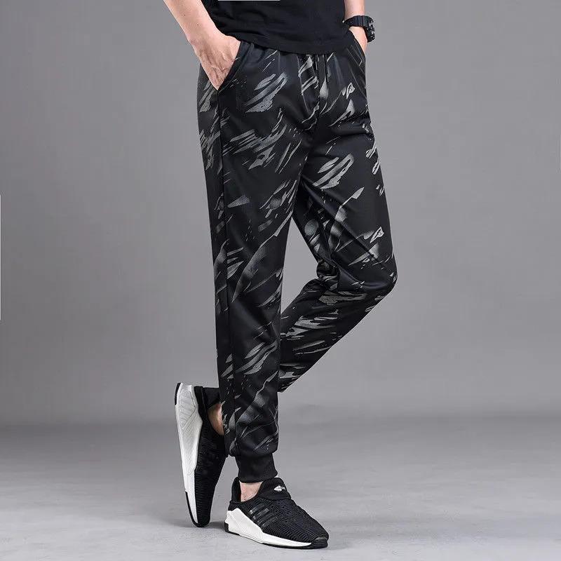 Product Introduction of Autumn Trousers Men Stretch Camouflage Pant Casual Leg Fitting Sweatpants Loose Wear-resistant Trousers 10