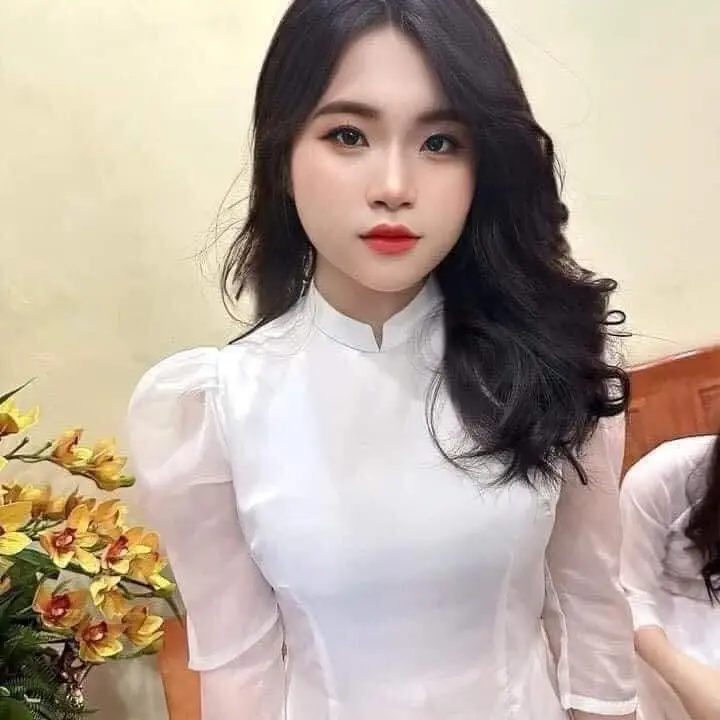 Áo dài trắng học sinh 4 tà tay lỡ bồng siêu xinh