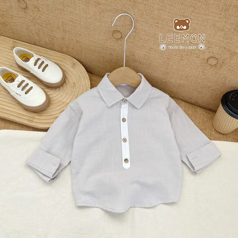 Áo sơ mi dài tay đũi phối khuy hai màu cho bé trai 4