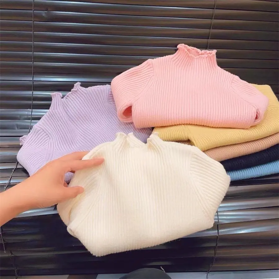 Áo len cổ cao có phối bèo xinh cho bé gai xinh iu