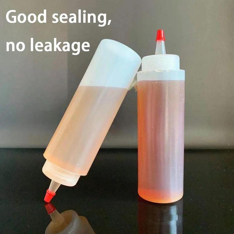 Product Introduction of Sauce Squeeze Bottle Plastic Pointed Salah Dressing Condiment Squeeze Bottles with Red Lid Mustard Dispensers Kitchen Supply 25