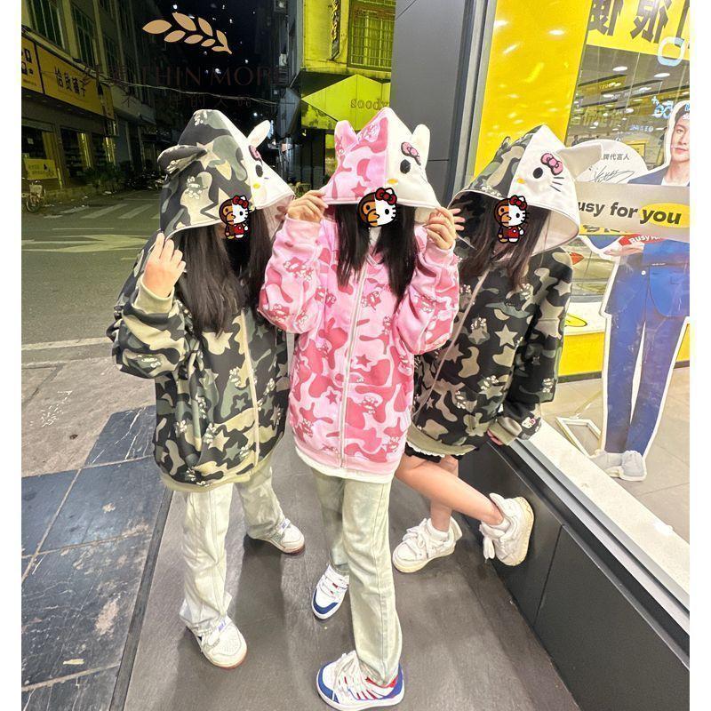 Áo Len Ngoại Cỡ Có Mũ Trùm Đầu Phong Cách Mỹ In Đầy Đủ Thiết Kế Hello Kitty Áo Cardigan Mùa Thu Và Mùa Đông Cho Nữ Có Khóa Kéo Áo Khoác Rằn Ri Top Women