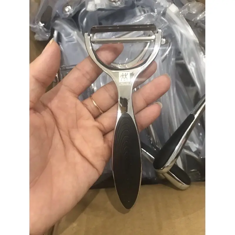￼Dụng cụ bào / nạo vỏ Đức,  inox sáng đẹp, cầm êm tay