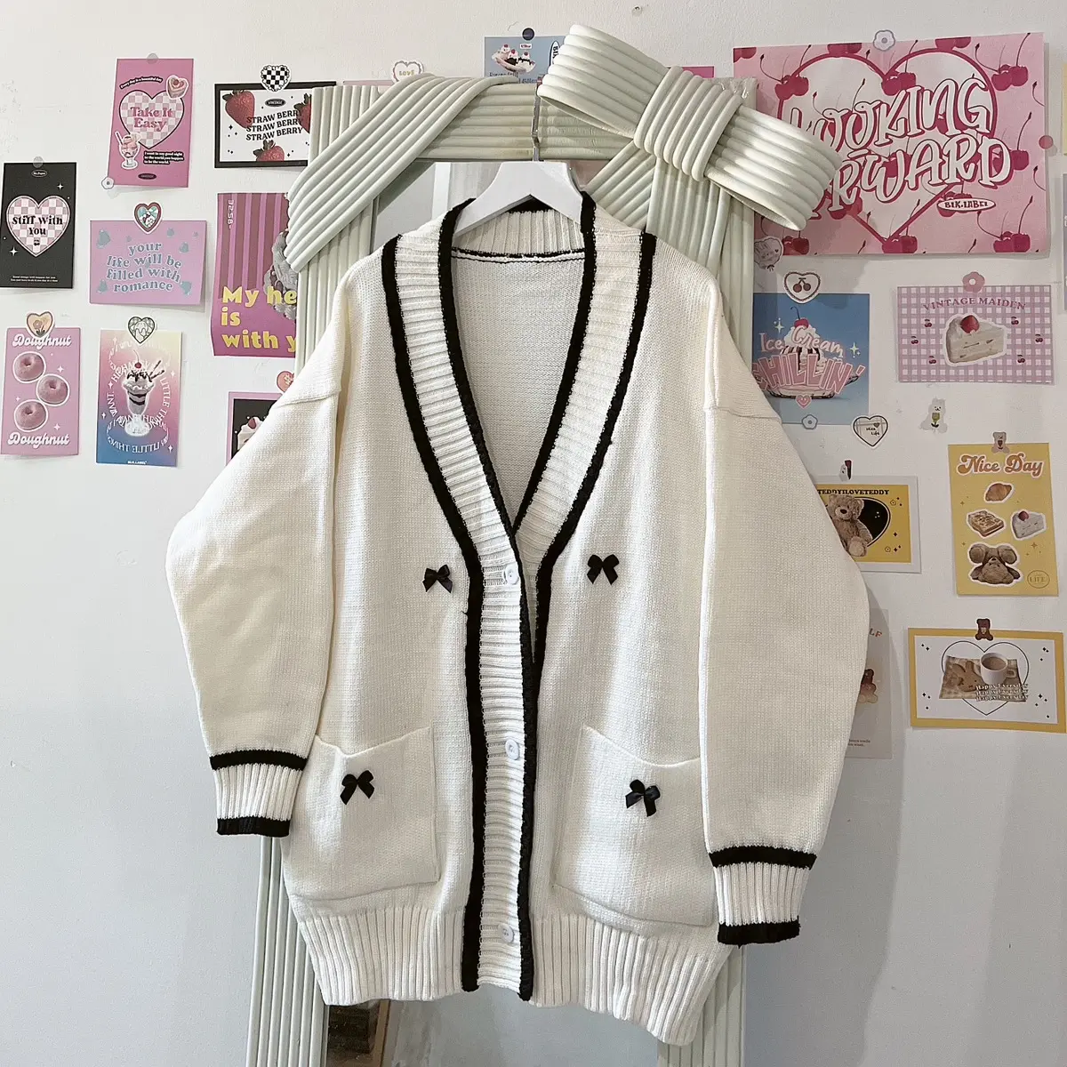 ÁO CARDIGAN TRẮNG VIỀN NƠ ĐEN