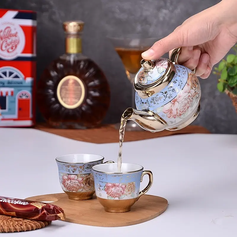 [Sẵn hộp] Bộ Ấm Chén (Gồm 1 ấm 4 chén), thiết kế sang trọng gốm sứ mạ điện cao cấp