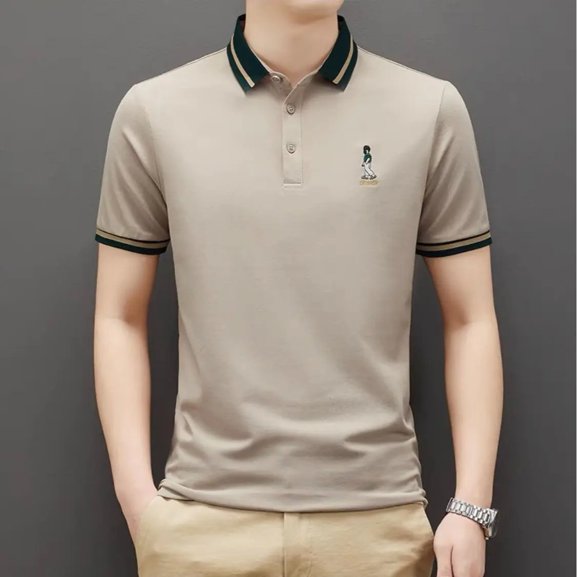 Áo PoLo thêu Người chất vải mắt chim UMA