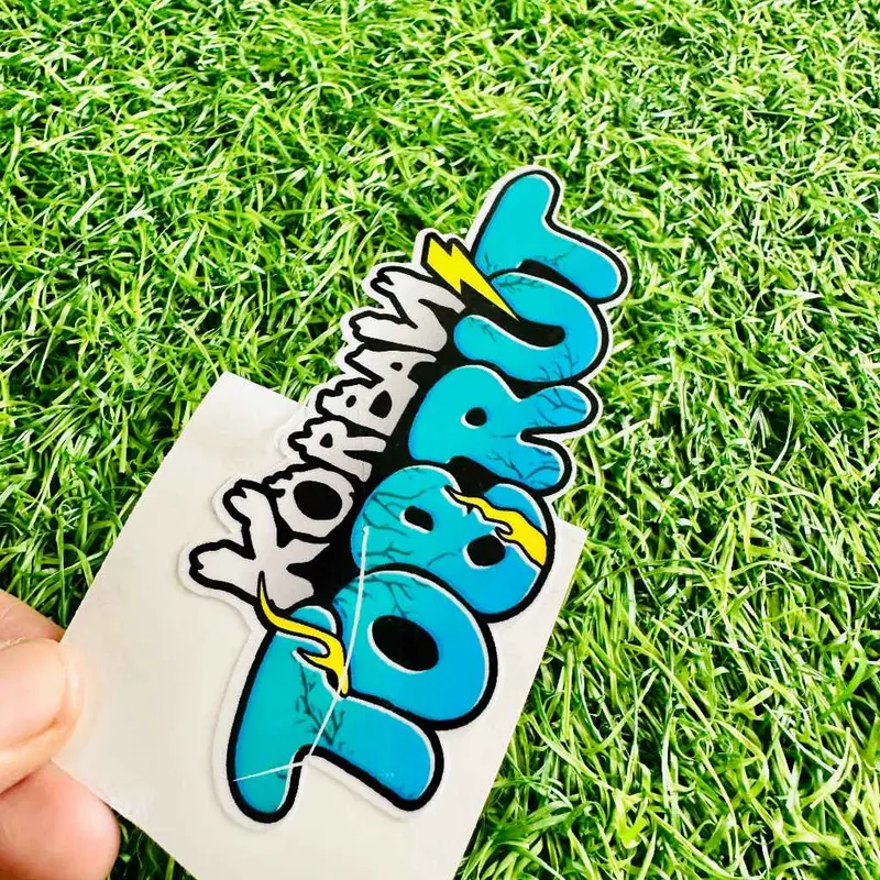 Stiker Sticker Korban Tobrut 10cm x 4.5cm: Vinyil Glossy & Hologram dengan Potongan Presisi 0