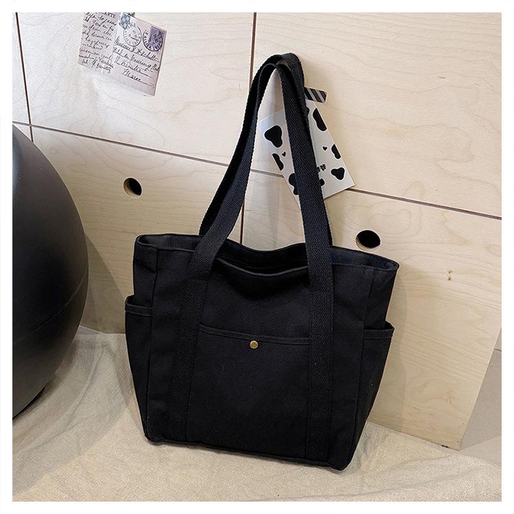Product Introduction of TANLE 【Low price discount】Travel bag Canvas bag Commuter bag Versatile multiple pockets | High quality fabric | Multiple back methods | Comfortable lining | Fashionable essential for travel Suitable for school, travel, and work 17