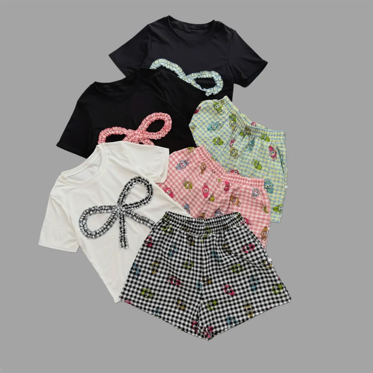 Bộ nơ hoạ tiết áo babytee phối quần dáng A cho nữ bigsize50-95kg sét phối nơ