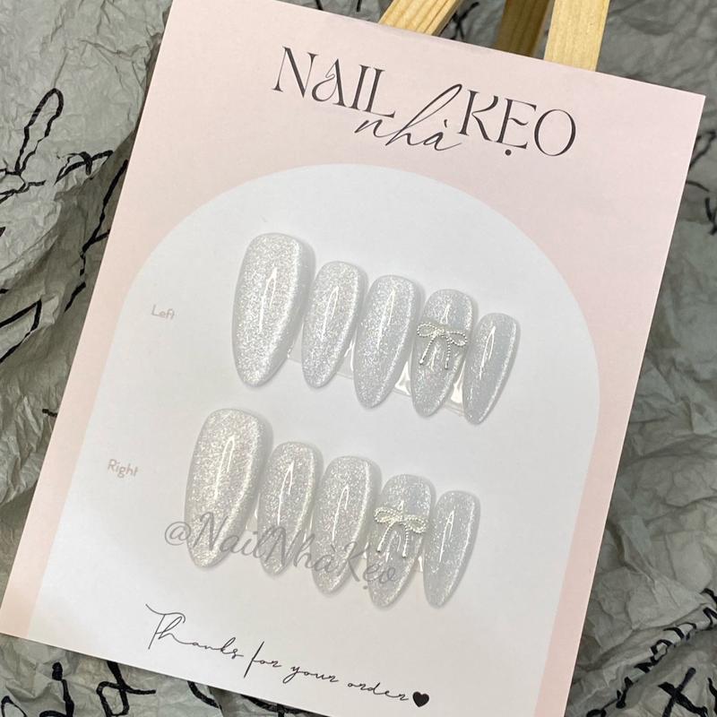 K50- nail box thiết kế Mắt mèo kim cương trắng phối nơ thừng