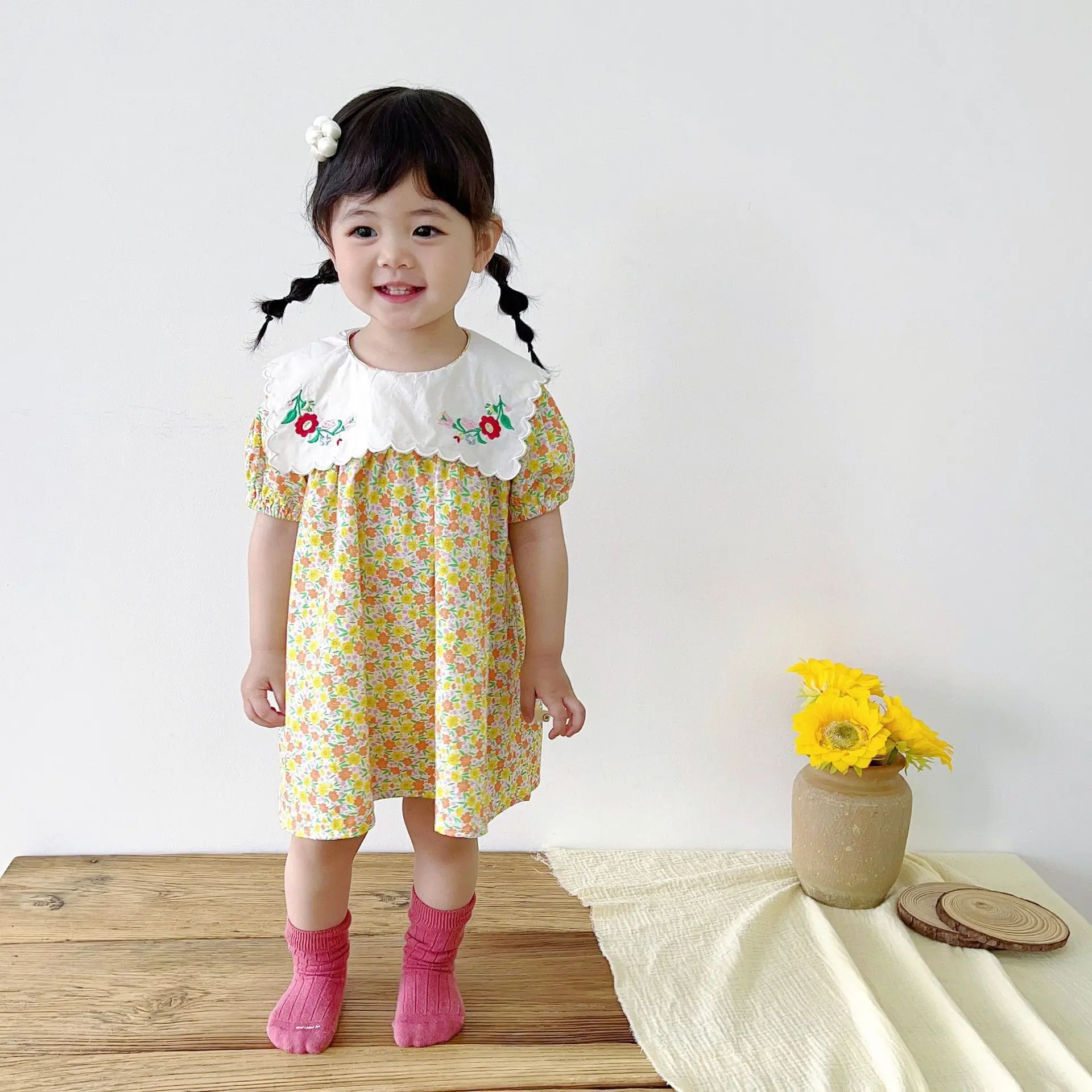 D512 ชุดเดรสกระโปรงลายดอกไม้สีเหลือง