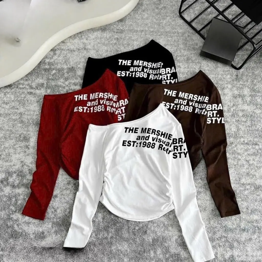 Áo tay dài chéo vai nhún sườn in chữ nhiều lên trước và tay chất bozip mềm ls Nữ Women Thun Tim