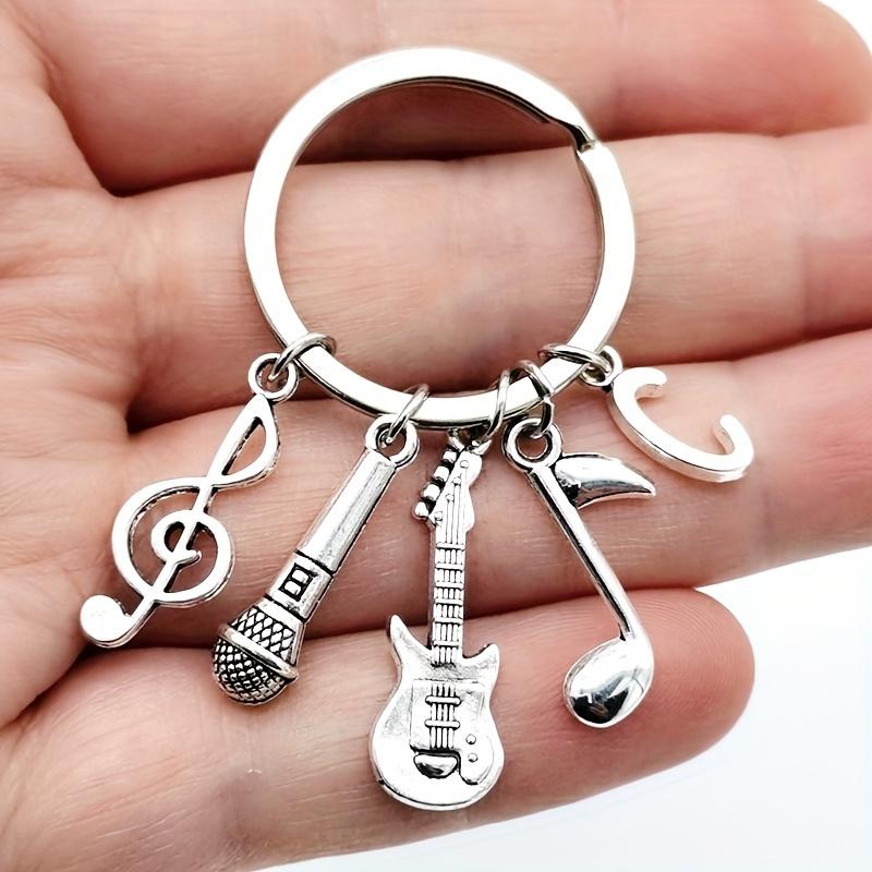 Product Introduction of 1 Piece Creative Fashion A-Z Letter Music Keychain, with Musical Notes, Microphone, and Guitar Pendant - Creative Jewelry - Ideal Decoration for Your Keys and Bags! 2