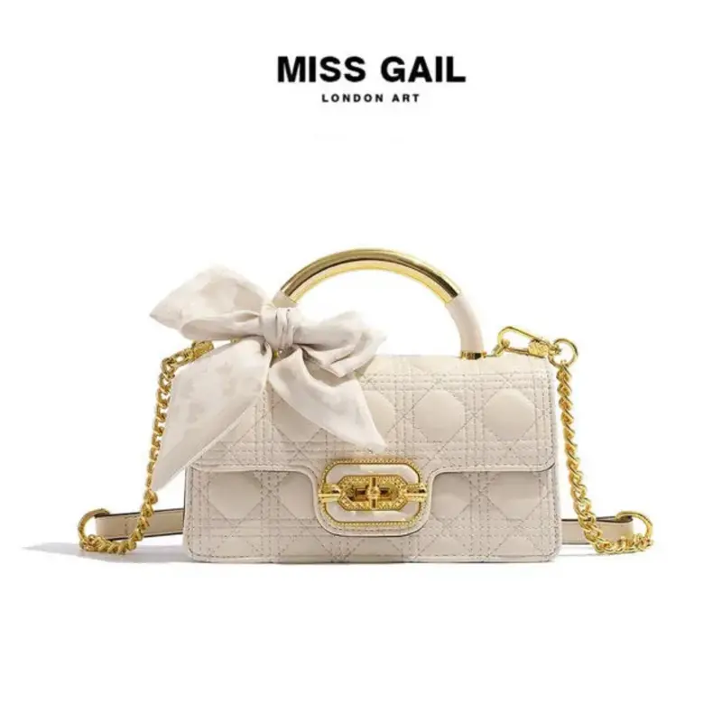 MG6992-1. Túi xách nữ MISS GAIL Store HongKong thiết kế ô trần trám kèm nơ sang trọng, thanh lịch. Đeo vai/ xách tay. Full box hãng.  Bag 0